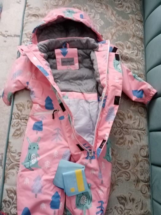 Продам новый комбинезон весна осень