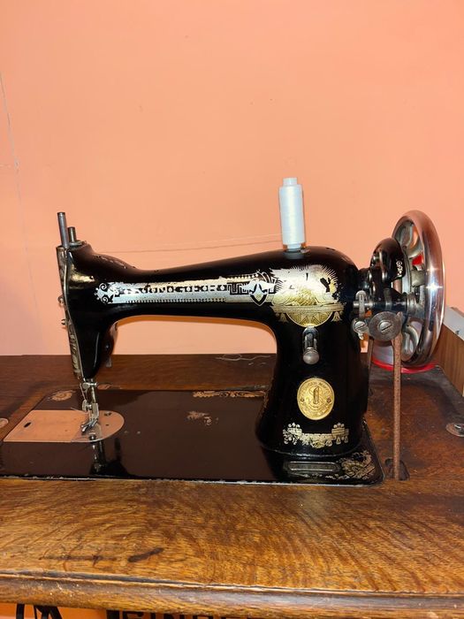 Masina de cusut Singer