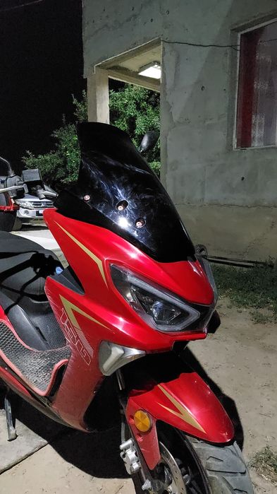 Макси скутер тоё.