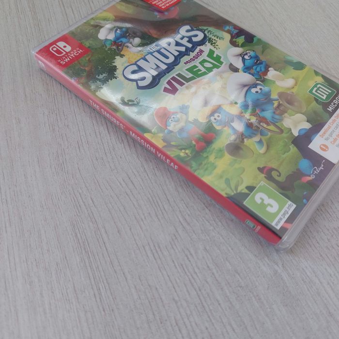 НОВА The Smurfs: Mission Vileaf за Nintendo Switch | (Code in Box)