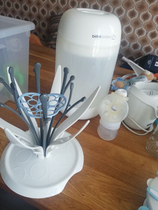 Стерилизатор в комплект с машина за подгряване и сушилка.