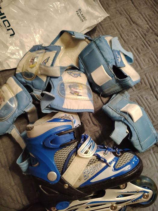 Коньки роликовые