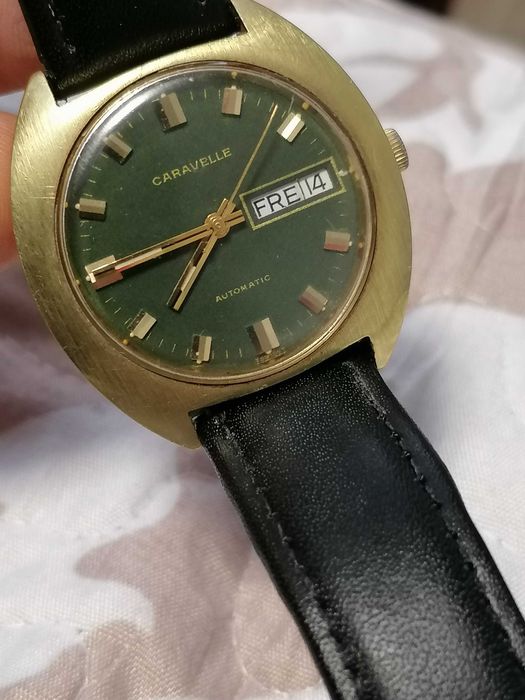 Caravelle by Bulova Day Date automatic Swiss