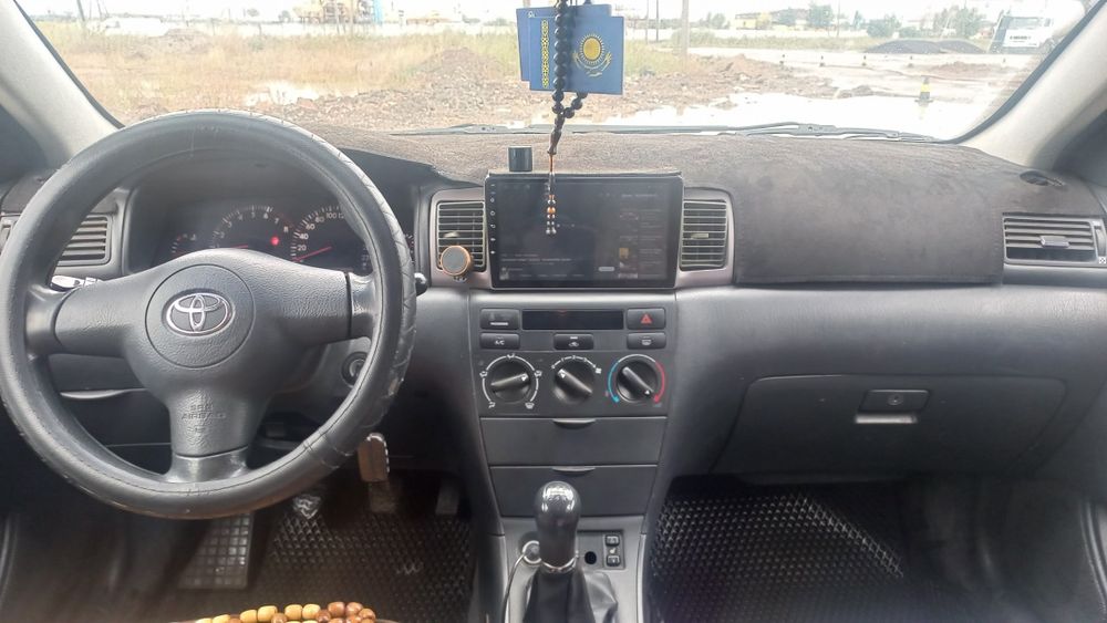 Тойота каролла 2004 г