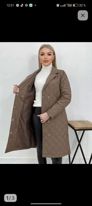 Стеганное польто. Размер 50  новый. Производство Россия.