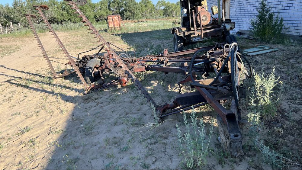 Косилка трехбрусная.