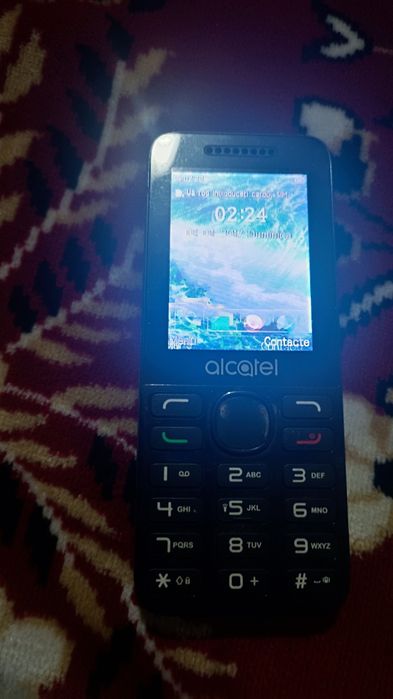 Super oferta telefon Alcatel+baterie externa tot la 100lei