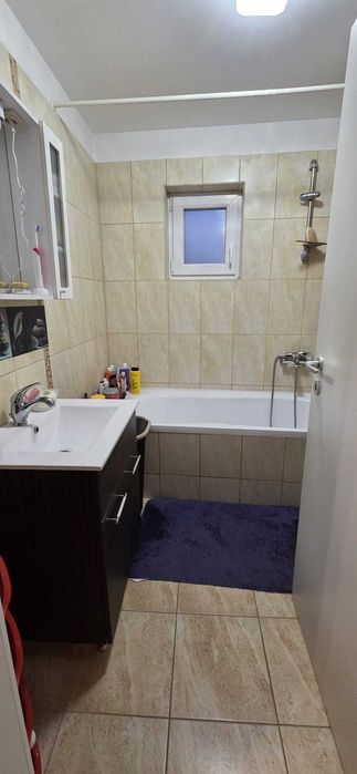 Apartament cu 2 camere cu curte– Confortul de la bloc îmbinat cu beneficiile unei case!