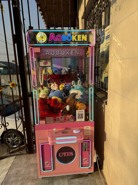 Игровой аппарат хватайка