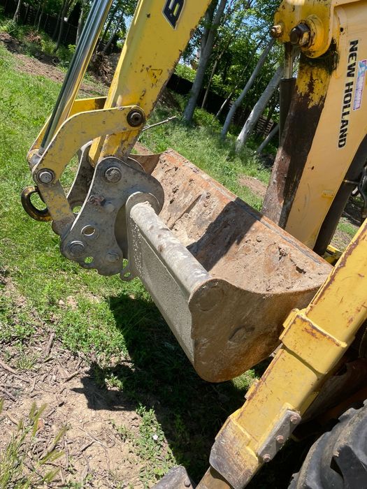 Buldoexcavator New Holland 2012 factura TVA