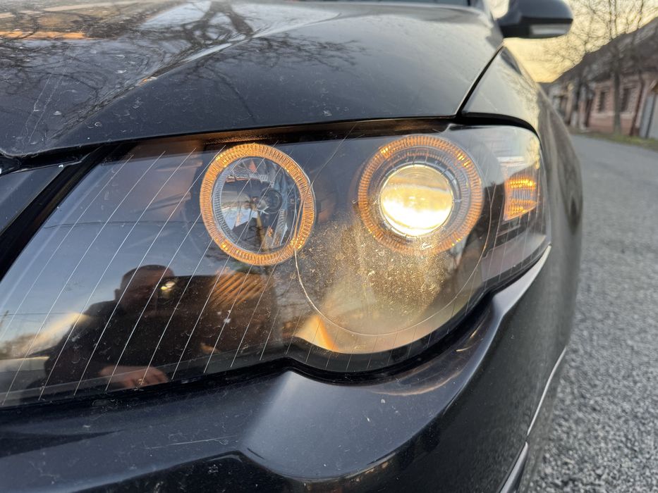 Vand faruri Passat b6 cu angel eyes perfecte ca noi!