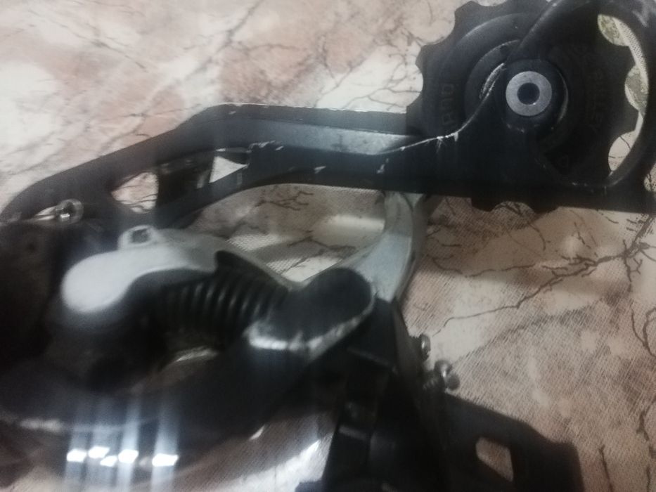 Vând schimbător pinioane shimano XT shadow