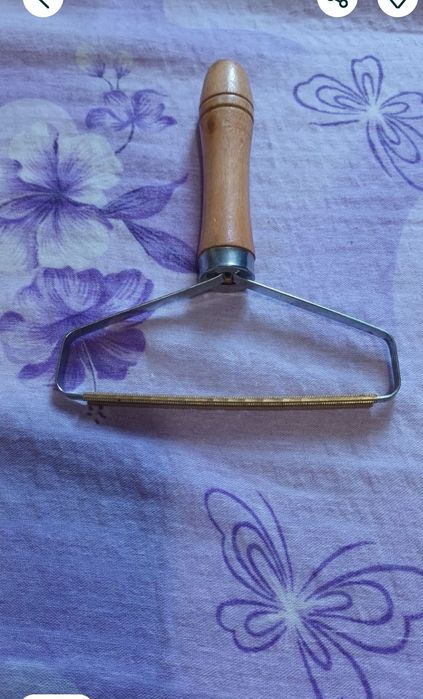 Dispozitiv pentru înlăturat scame