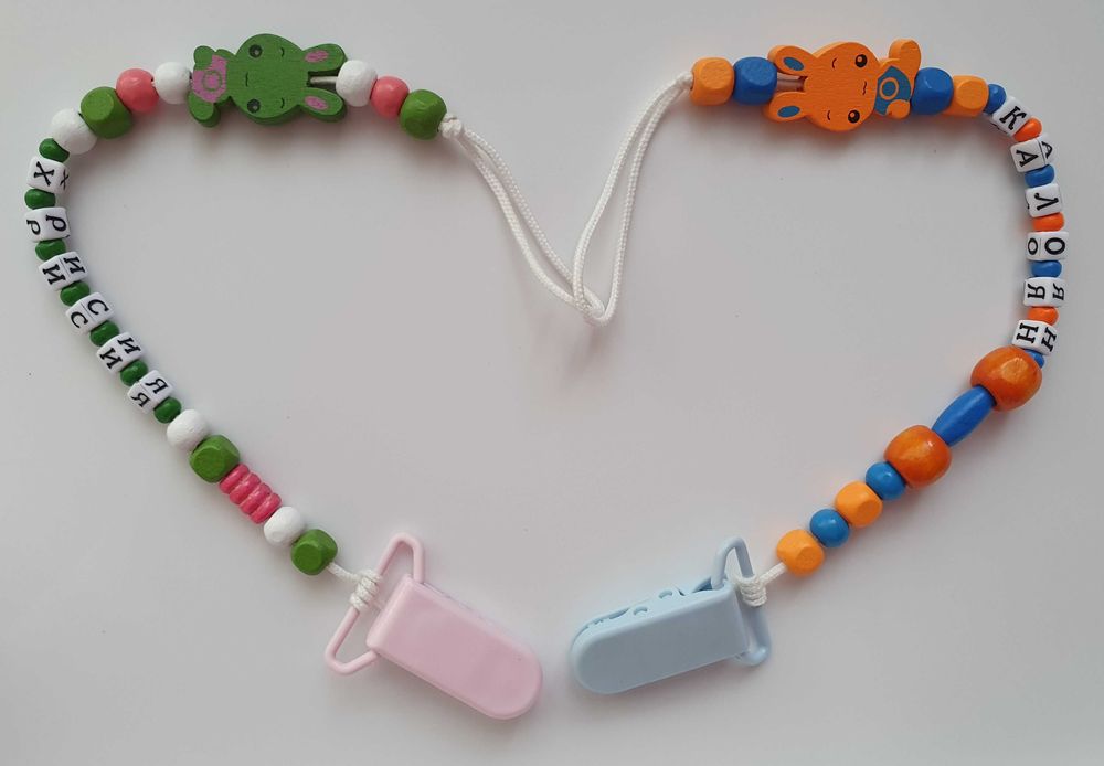 Клипс за биберон и чесалка