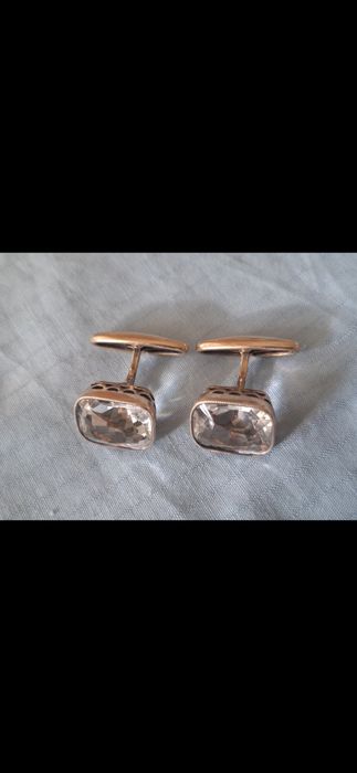 Запонки серебряные.