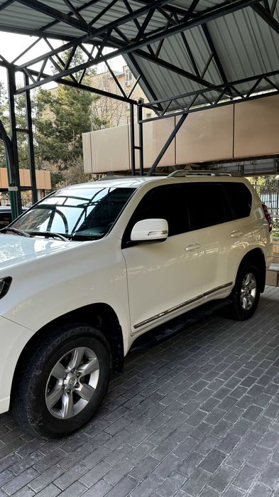 Toyota Prado 150 белый, обслужен, без вложений.