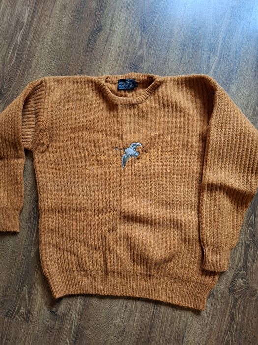 Дамски пуловери .