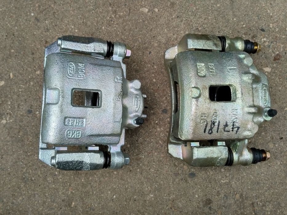 Суппорт Киа К5 привозной