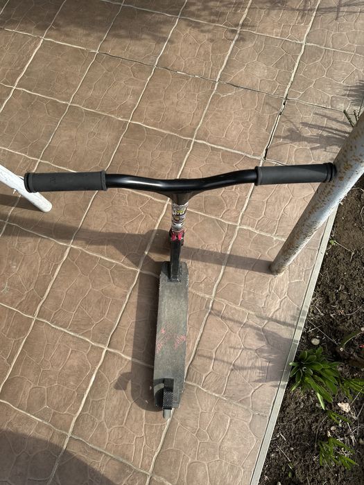 Vand trotineta freestyle negru/rosu in stare buna