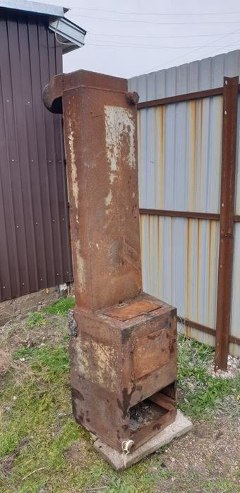Продам печь котел отопления.