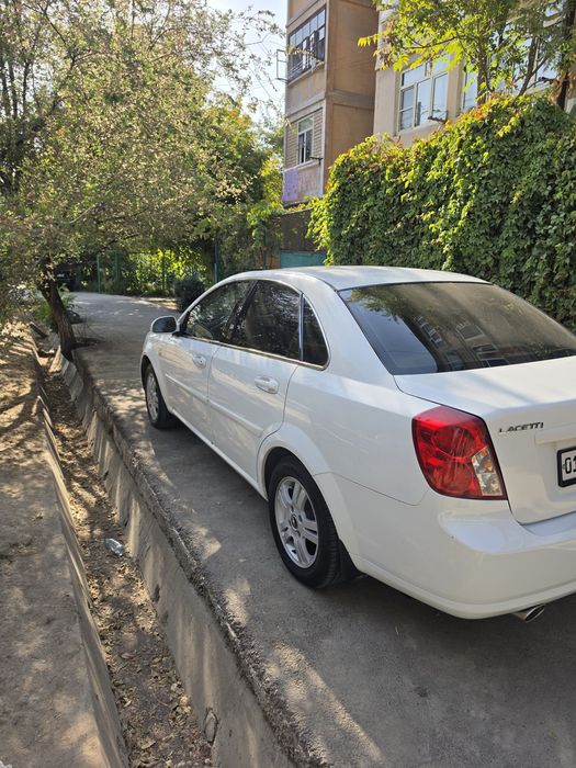 Lacetti 1.6 2013год 3 поз.автомат 6300 у.е. Белый