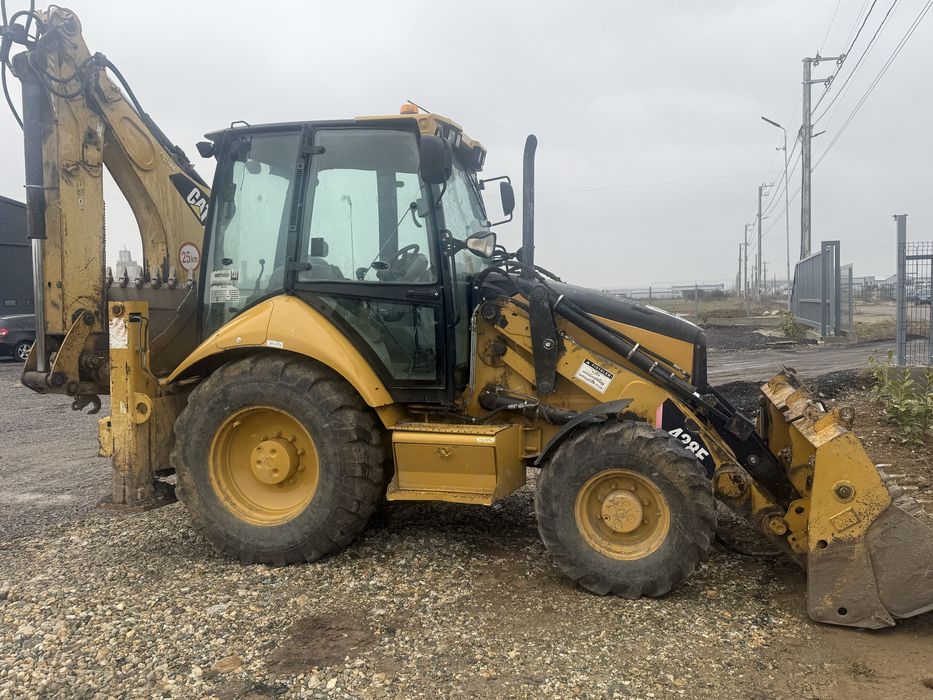 Buldoexcavator Caterpillar