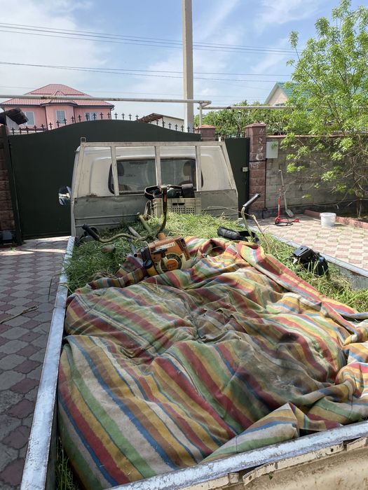 Покос травы с триммером