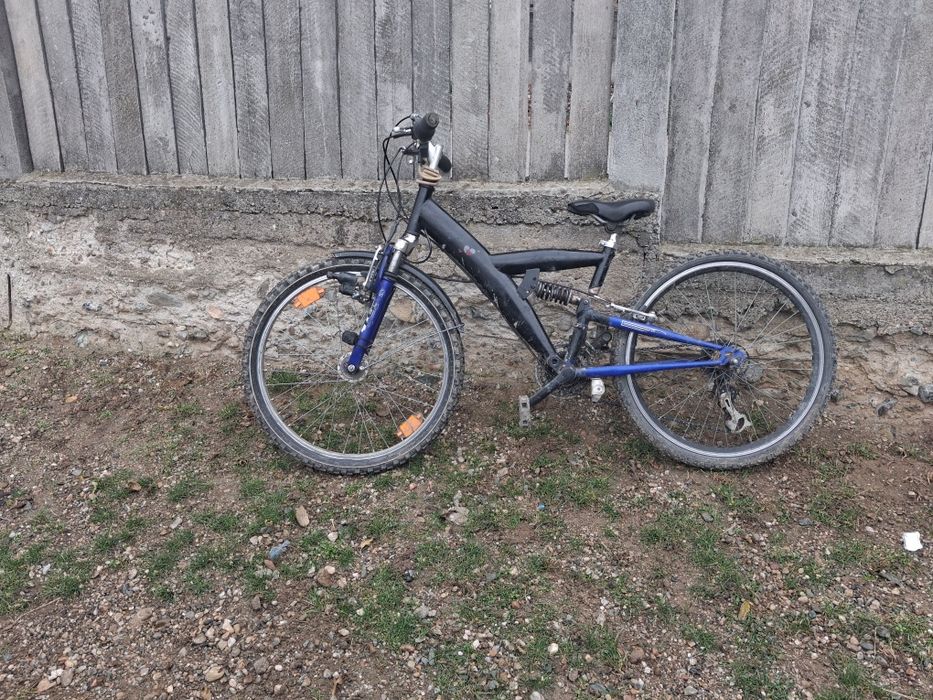 Bicicletă cu fulgera suspension