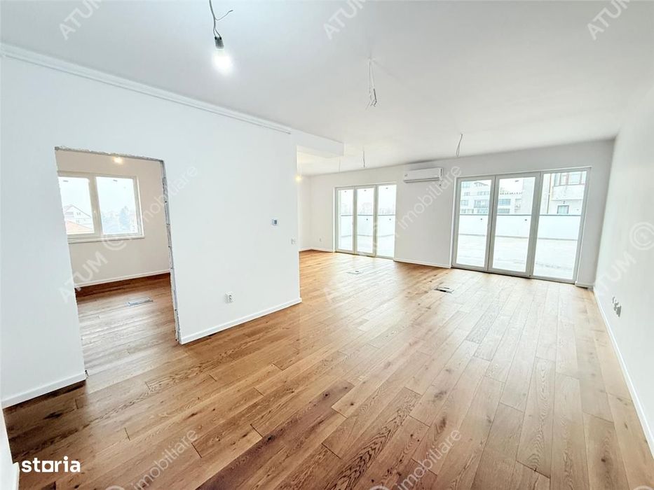 Penthouse cu 4 camere 111 mp utili terasa 78 mp doua locuri parcare