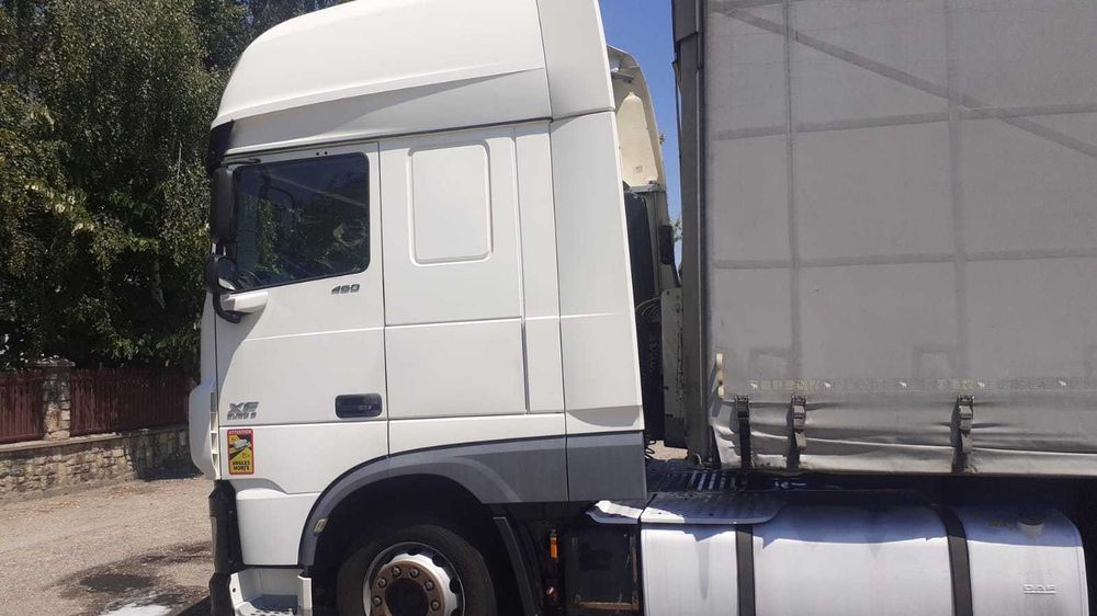 Ansamblu cap tractor Daf XF 460 Low Deck + semiremorca prelata Vario Schmitz 2011 (NT 70 + 36 RIX)