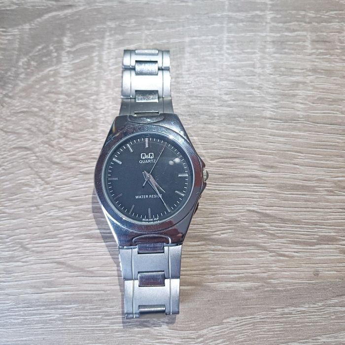 Мъж Часовник q&q