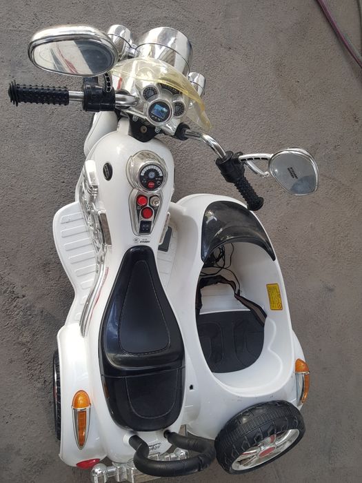 Мотоцикл  детский двухместный