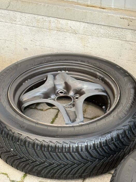 Set roți originale Dacia R15 + Michelin CrossClimate 2 DOT 2024 + capace