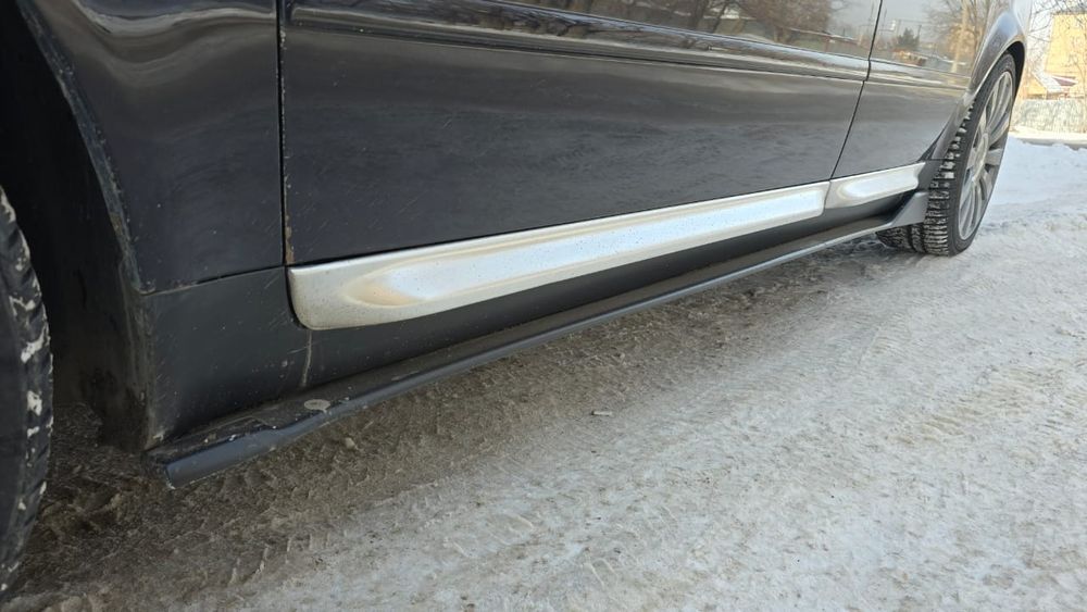 Audi A6C5 Элероны на пороги