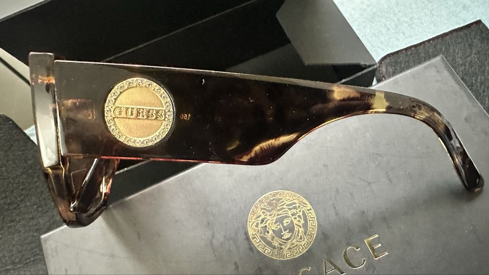 Ochelati dama si barbatesti Guess originali din UK