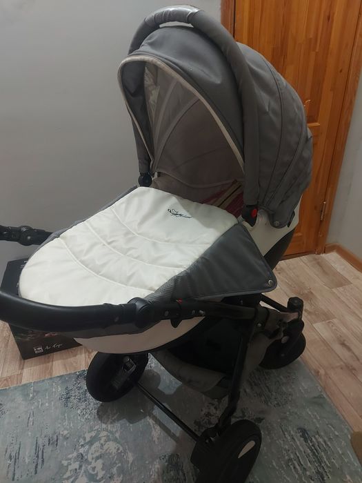 Детская коляска   Tutis