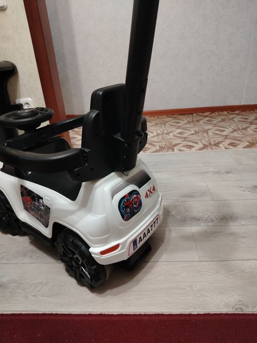 Толокар с родительской ручкой