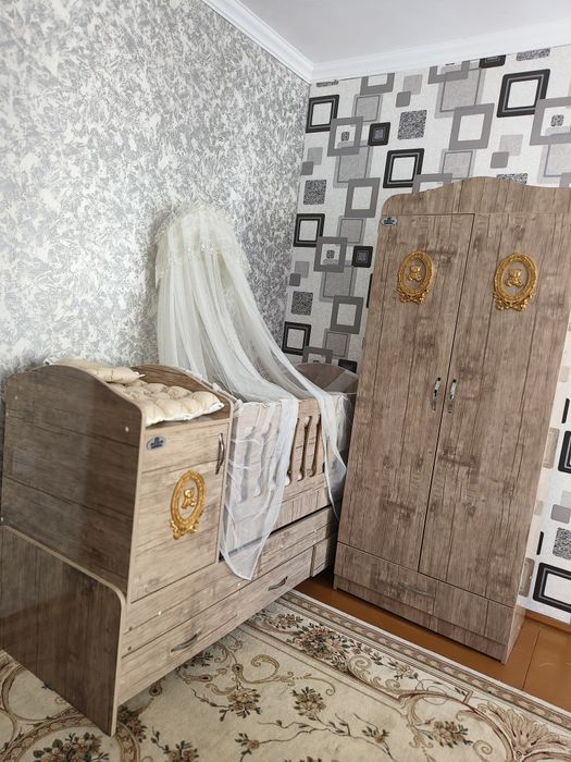 Детская кроватка со шкафом