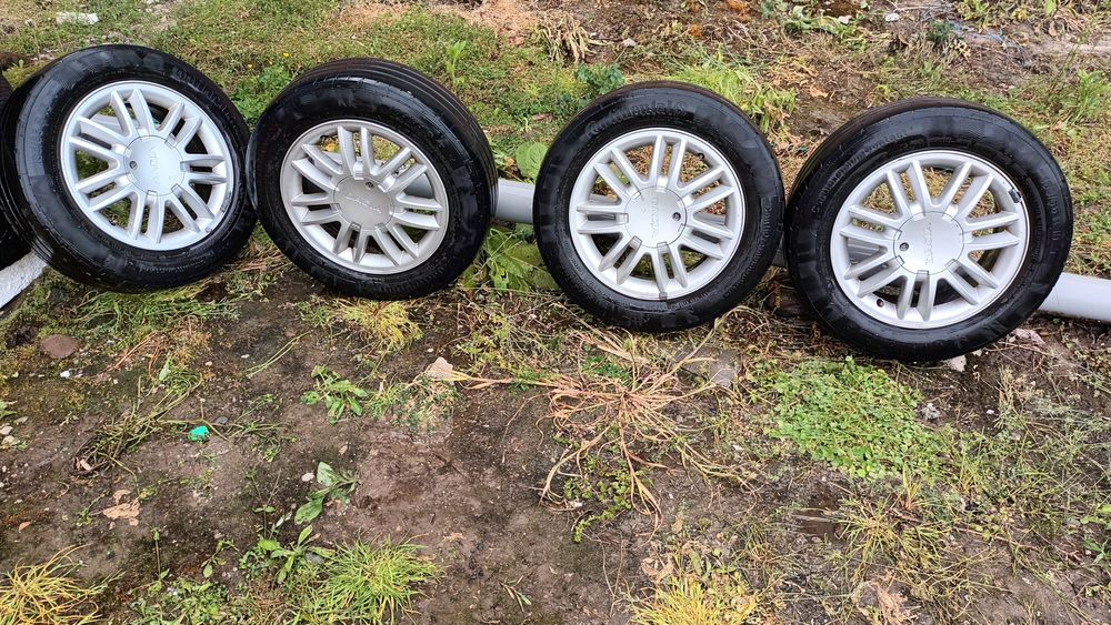 Jante din aliaj, îngrijite, provenienta Logan Prestige, cu anvelope Continental  185 65 R15