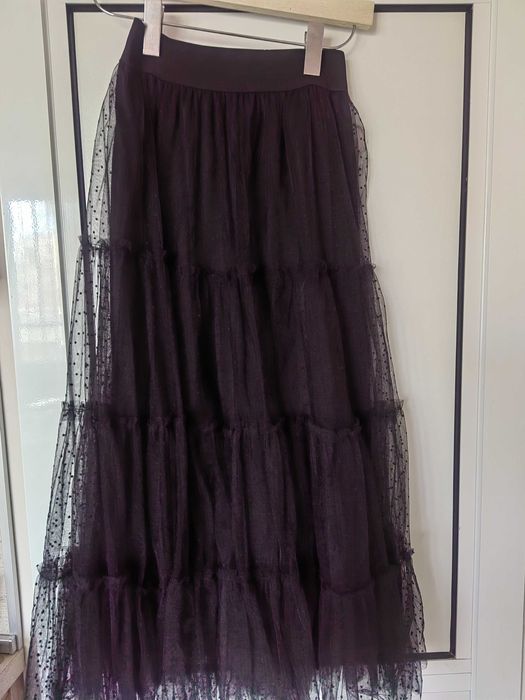 Пола от черен  тюл..