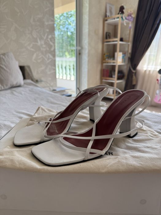 Бели сандали By far