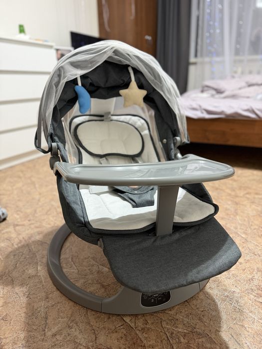 Продам детскую электронную качелю