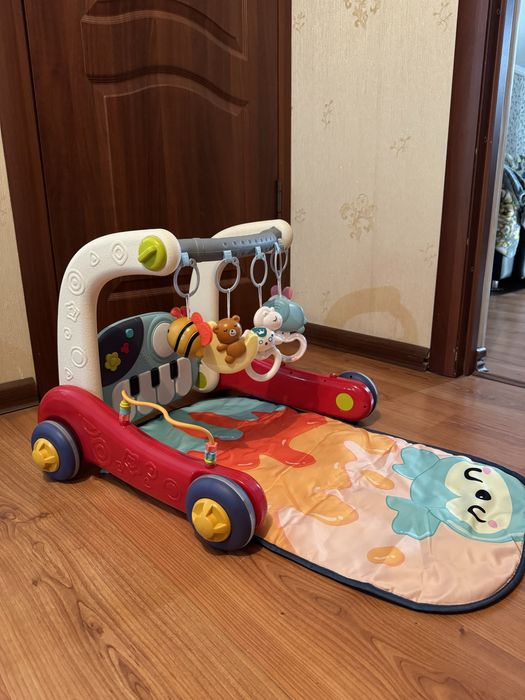 Музыкальный коврик и толокар