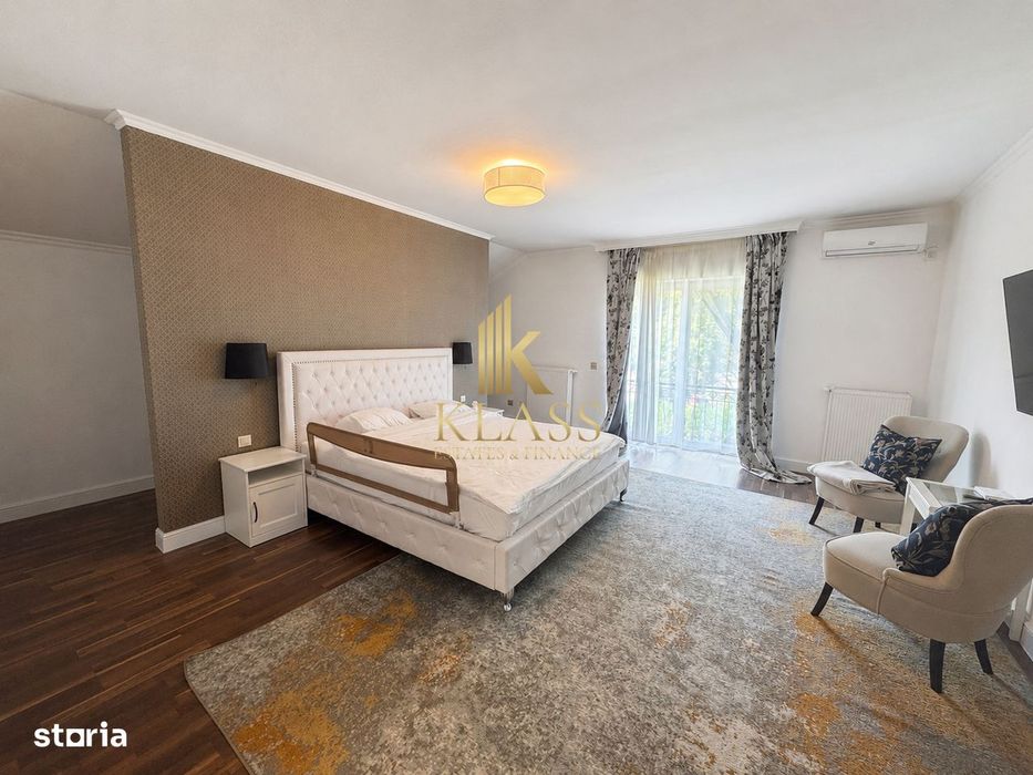 Casa moderna pentru inchiriere cu 4 dormitoare, gradina privata plus g