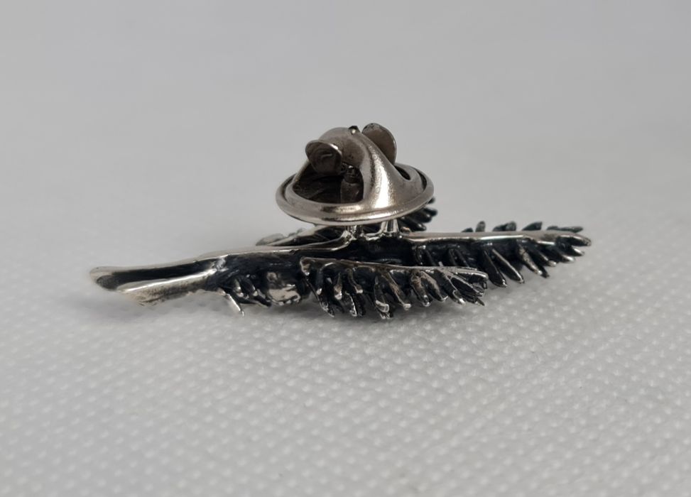 Podoabă de vânătoate din argint