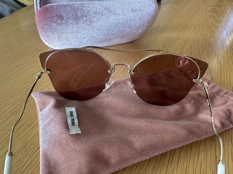 Слънчеви очилаMiu Miu