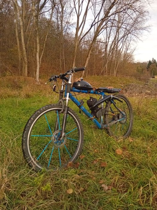 Vand bicicleta cu motor 100cc 2t