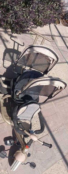 эгизак велосипед, икки ўриндиқли. Болалар учун коляски.