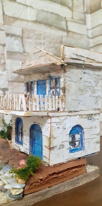 Ръчно изработени макети на къщи.