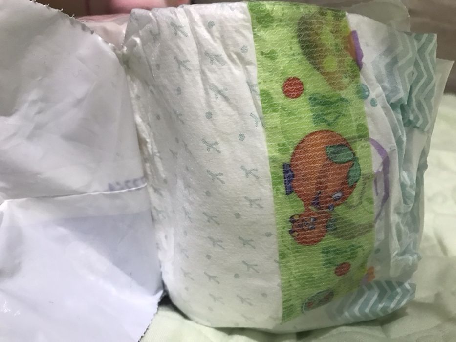 Продам новые подгузники